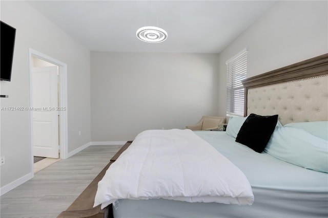 bedroom featuring light hardwood / wood-style flooring