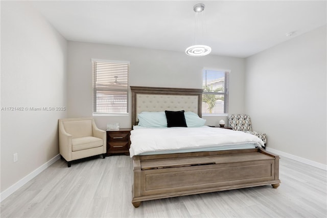 bedroom featuring light hardwood / wood-style floors