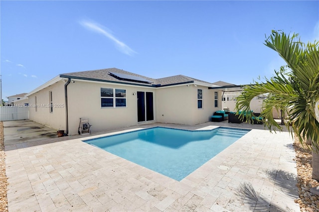 view of swimming pool with a patio area and an outdoor hangout area