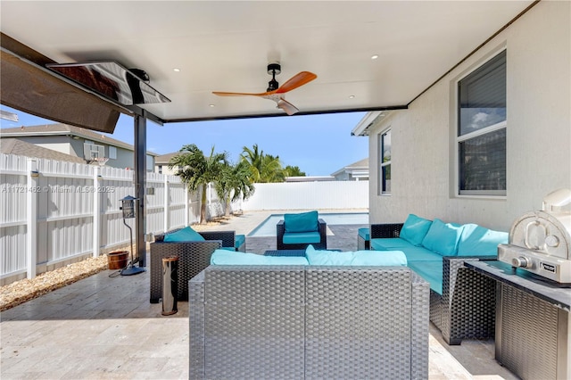 view of patio featuring an outdoor living space and ceiling fan