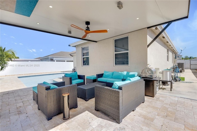 view of patio featuring an outdoor hangout area and a fenced in pool