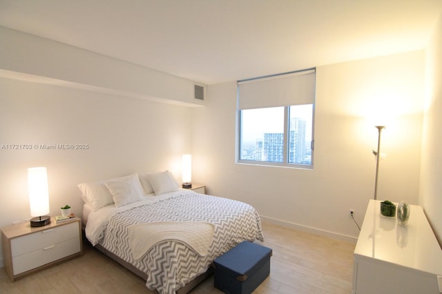 bedroom featuring light wood-type flooring