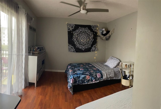 bedroom featuring ceiling fan and hardwood / wood-style flooring