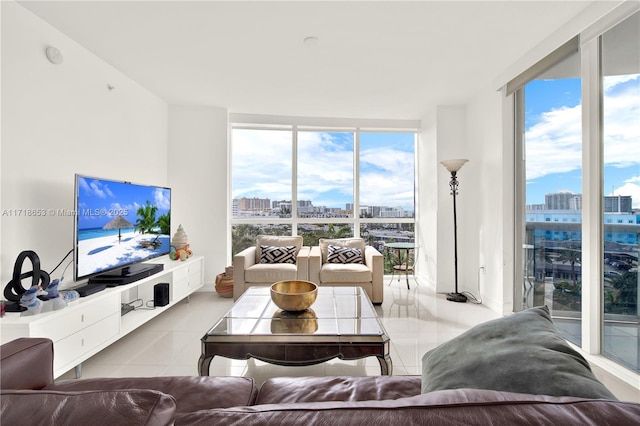 tiled living room with a wall of windows