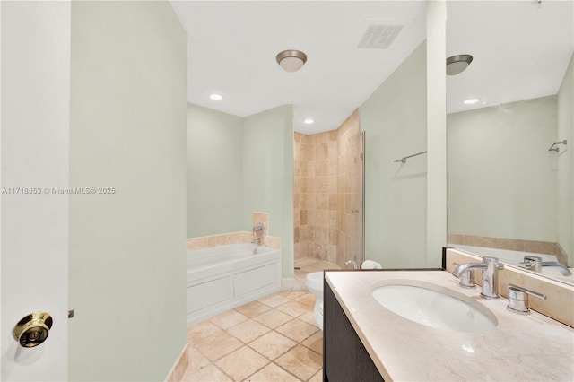 bathroom featuring shower with separate bathtub, vanity, and tile patterned floors