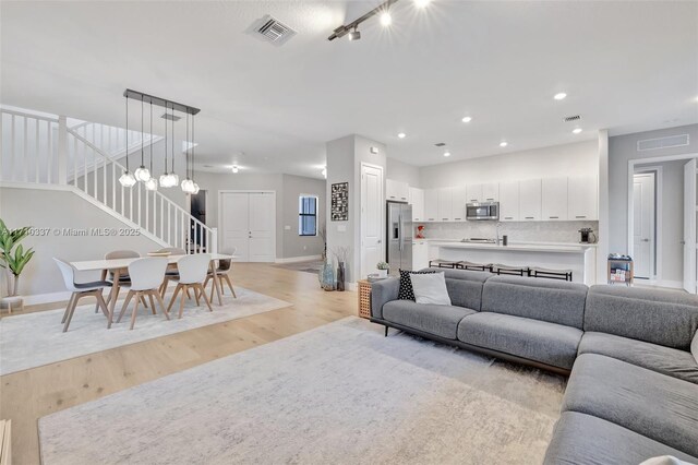 living room with light wood-type flooring