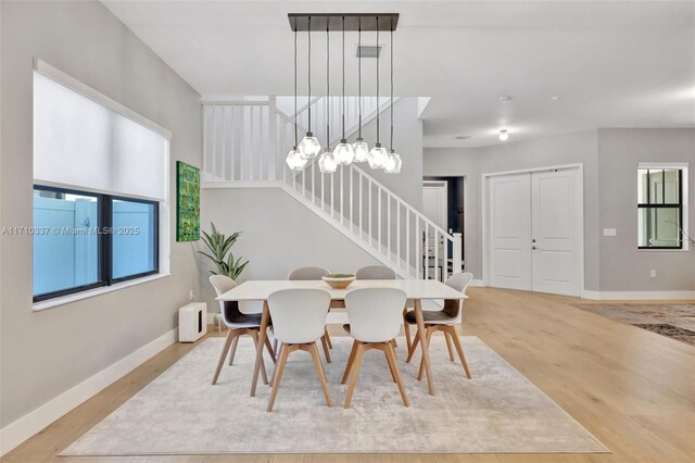 dining room with light hardwood / wood-style flooring