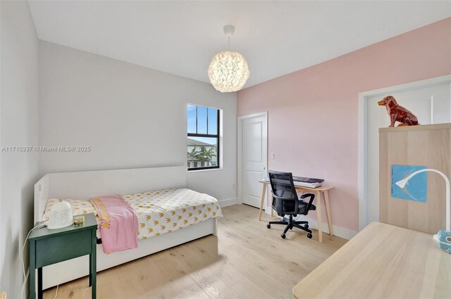 bedroom featuring hardwood / wood-style floors