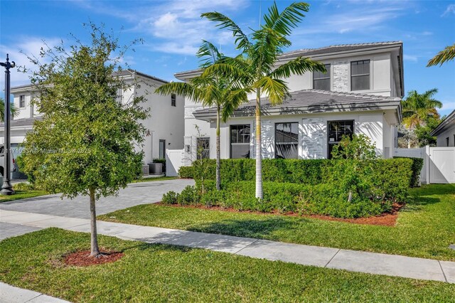 view of front facade with a front yard