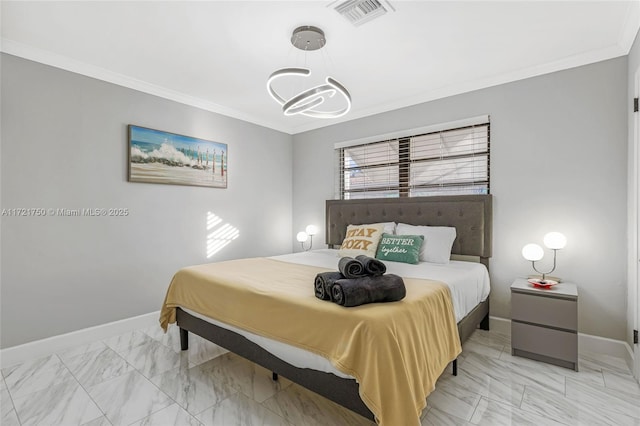 bedroom with a notable chandelier and crown molding