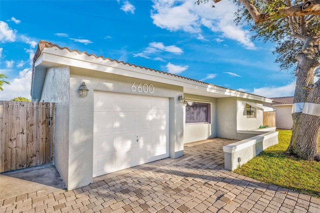 view of home's exterior with a garage