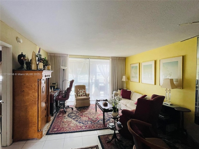 tiled living room with a textured ceiling