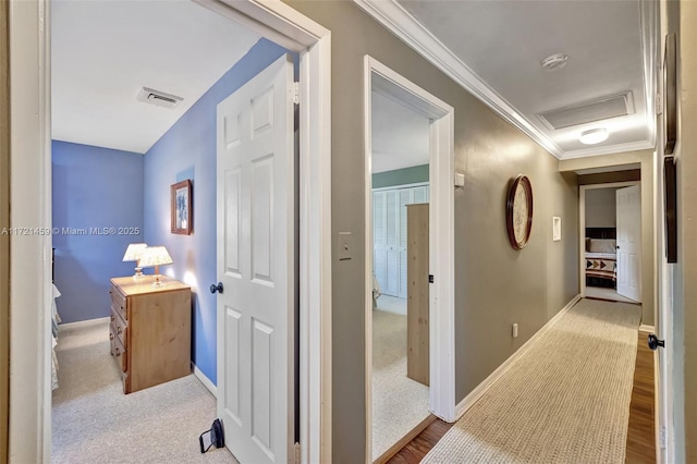 corridor featuring crown molding