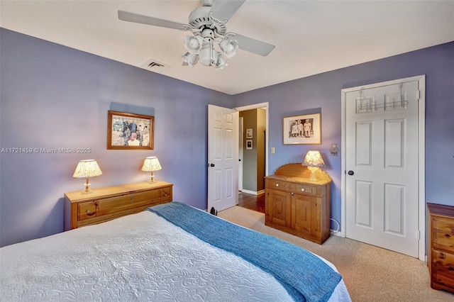 carpeted bedroom featuring ceiling fan