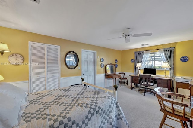 bedroom featuring carpet flooring, ceiling fan, and a closet