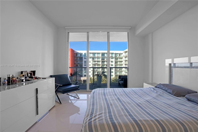 7751 NW 107th Ave Unit 509, Doral, FL 33178 - bedroom featuring expansive windows and light tile patterned flooring