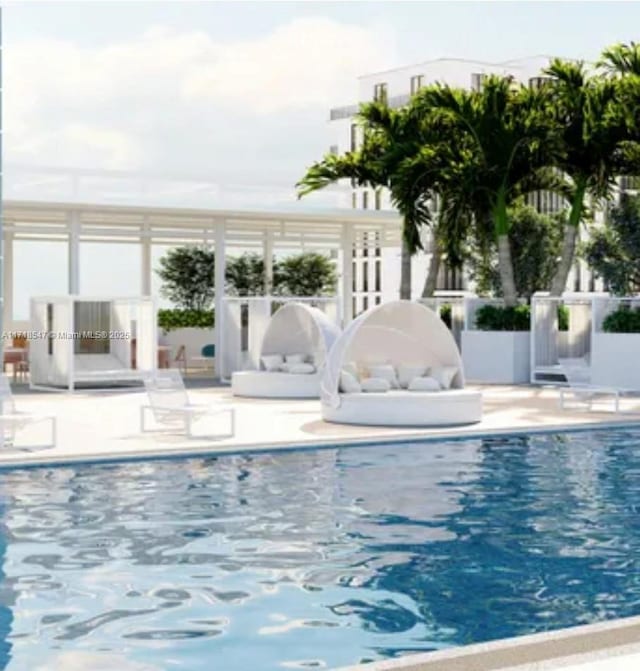 7751 NW 107th Ave Unit 509, Doral, FL 33178 - pool featuring a patio area