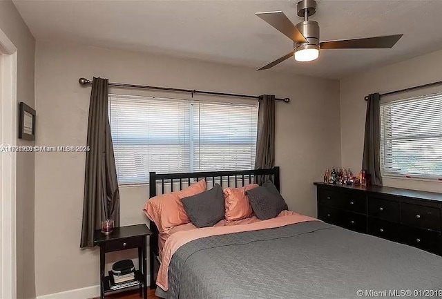 bedroom featuring ceiling fan