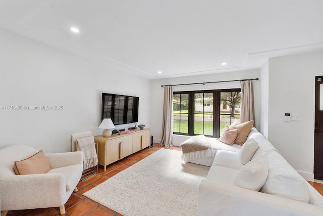 living room with tile patterned floors