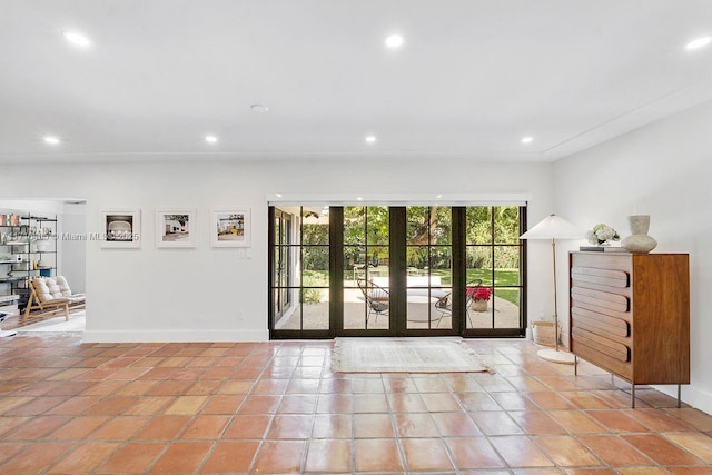 doorway featuring light tile patterned flooring