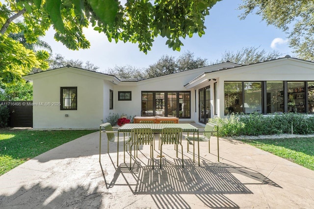 rear view of house with a patio area