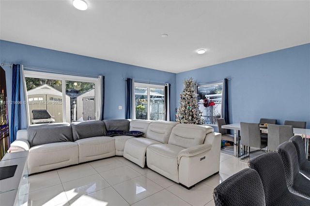 living room with light tile patterned flooring