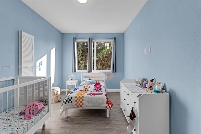 bedroom with wood-type flooring