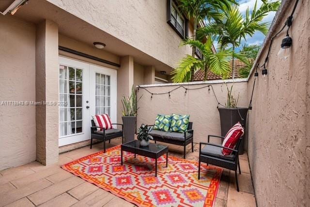 view of patio with an outdoor hangout area and french doors