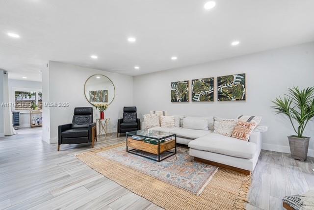 living room featuring light wood-type flooring