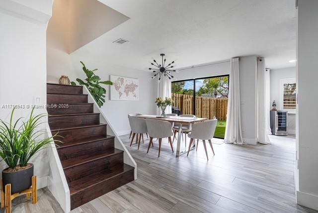 dining room with plenty of natural light and light wood-type flooring