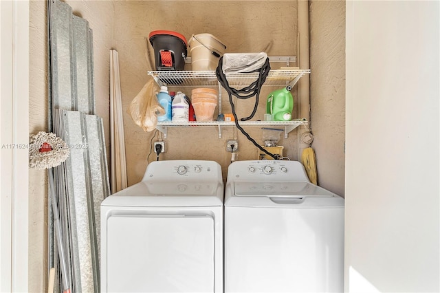 laundry room with washer and clothes dryer