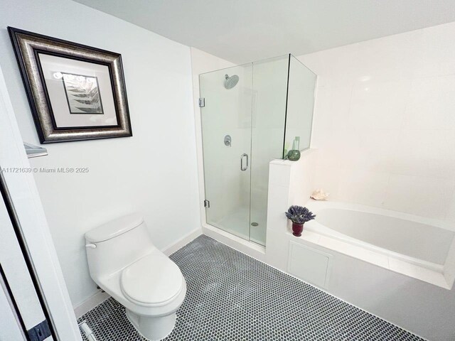 bathroom featuring tile walls, sink, lofted ceiling, and toilet