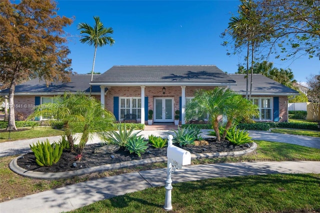 ranch-style home with french doors