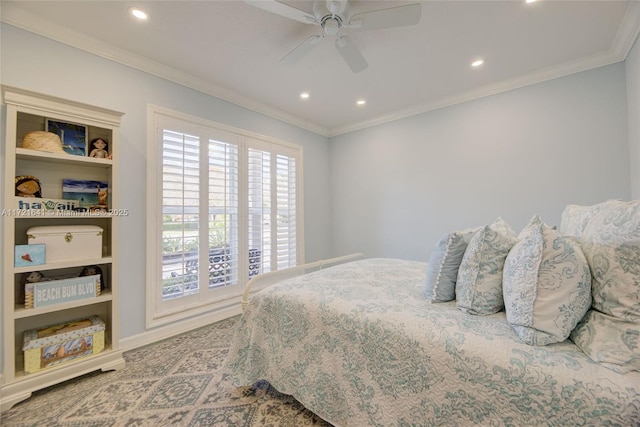 bedroom with ornamental molding, ceiling fan, and multiple windows