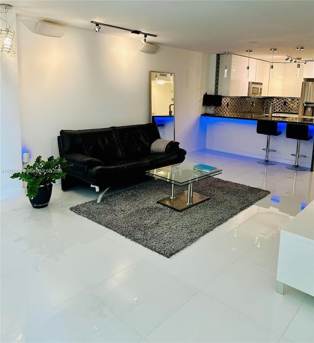 living room featuring light tile patterned flooring