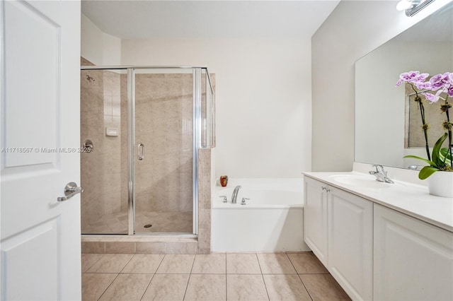 bathroom with vanity, separate shower and tub, and tile patterned floors