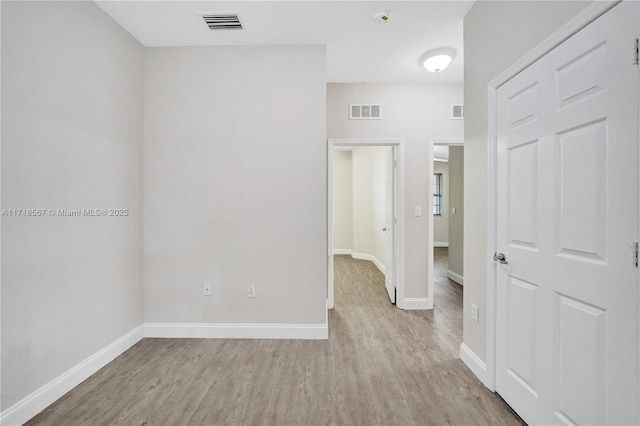 corridor featuring light hardwood / wood-style flooring