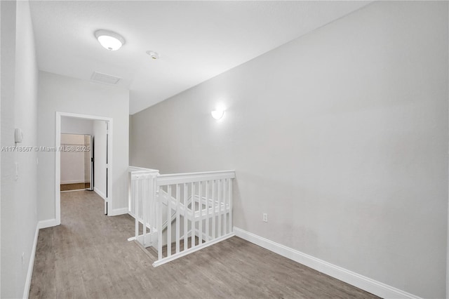 hallway featuring light hardwood / wood-style flooring