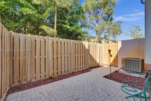 view of patio featuring central AC unit