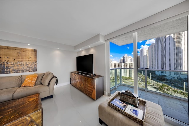 living room featuring a wall of windows