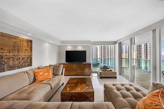 living room with tile patterned flooring and expansive windows