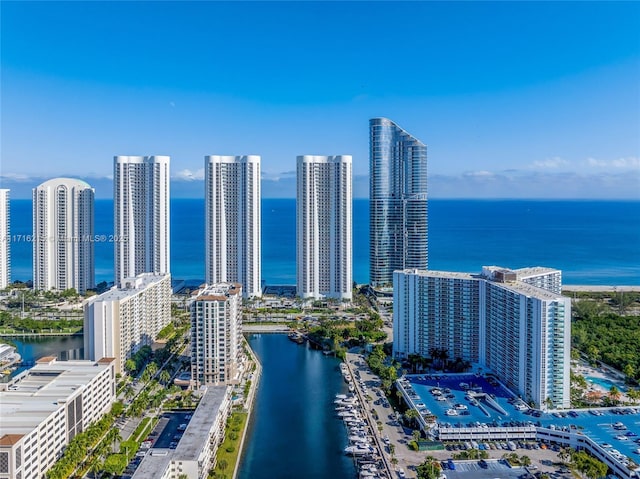 birds eye view of property featuring a water view