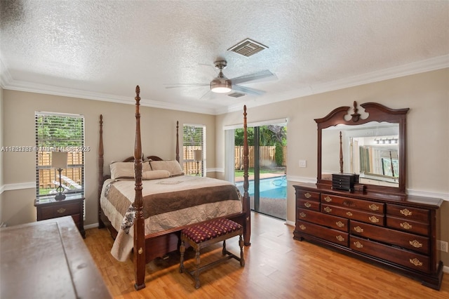 bedroom with access to exterior, ceiling fan, light hardwood / wood-style flooring, and ornamental molding