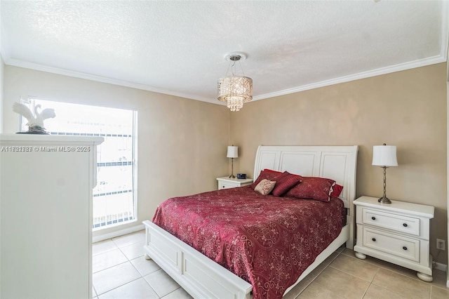 bedroom with a chandelier, light tile patterned floors, a textured ceiling, and crown molding