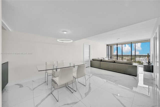 dining room with expansive windows