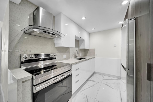 kitchen featuring white cabinetry, stainless steel electric range oven, sink, wall chimney range hood, and decorative backsplash