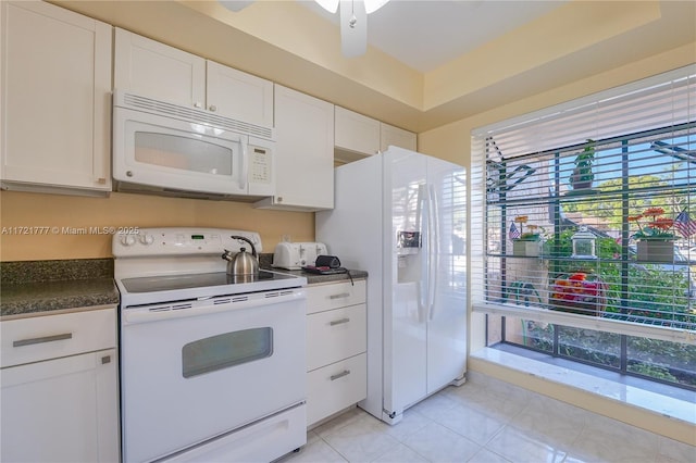 kitchen featuring ceiling fan, white cabinetry, and white appliances