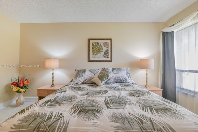 bedroom with a textured ceiling