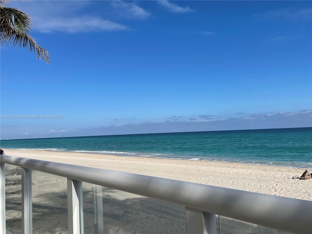 property view of water featuring a beach view