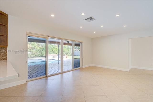 view of tiled spare room